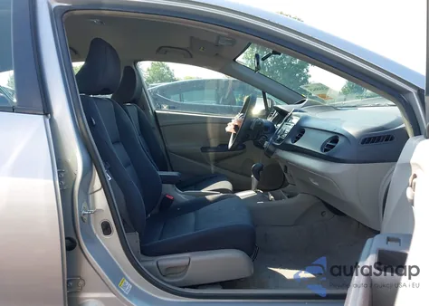 2010 Honda Insight Ex z USA, uszkodzony, nr VIN JHMZE2H77AS037072